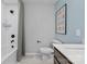 Bright bathroom with a shower-tub combo, stylish vanity and decorative wall art at 7105 Short Stirrup Ln, Mint Hill, NC 28227