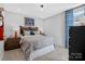 Cozy bedroom featuring a comfortable bed, stylish nightstands, and modern decor at 7105 Short Stirrup Ln, Mint Hill, NC 28227