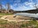 Backyard fire pit area with lake views, perfect for entertaining and enjoying the outdoors at 7117 Brookview Ln, Sherrills Ford, NC 28673