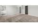 This bedroom offers neutral carpet, a walk-in closet, and neutral paint at 7117 Brookview Ln, Sherrills Ford, NC 28673