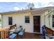 Back porch featuring outdoor seating and access to the home's entrance at 713 8Th Street Nw Dr, Hickory, NC 28601