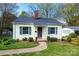 Charming single-story home featuring a well-manicured lawn and cozy front porch at 713 8Th Street Nw Dr, Hickory, NC 28601