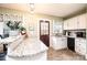 Inviting kitchen with granite countertops, white cabinets, and a convenient layout for cooking at 713 8Th Street Nw Dr, Hickory, NC 28601