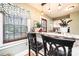 Charming kitchen nook with granite countertops, pendant lighting, and stylish patterned window treatments at 713 8Th Street Nw Dr, Hickory, NC 28601