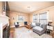 Bright living room with fireplace, modern furniture, and hardwood floors at 713 8Th Street Nw Dr, Hickory, NC 28601