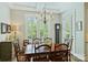 Dining room featuring a wooden table, shuttered windows, and natural light at 727 Bluff Loop Rd, Rock Hill, SC 29730