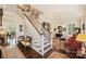 Spacious foyer featuring a staircase, hardwood floors, and elegant decor for a grand entrance at 727 Bluff Loop Rd, Rock Hill, SC 29730