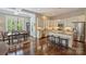 Bright kitchen featuring stainless appliances, granite countertops, and a cozy breakfast bar at 727 Bluff Loop Rd, Rock Hill, SC 29730