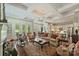 Open-concept living room with abundant natural light, hardwood floors, and stylish furnishings for modern living at 727 Bluff Loop Rd, Rock Hill, SC 29730