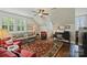 Cozy living room with comfortable seating, a ceiling fan, and charming decor at 727 Bluff Loop Rd, Rock Hill, SC 29730