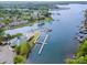 Beautiful aerial view of waterfront homes, multiple boat docks, and the scenic beauty of Lake Norman at 7829 Village Harbor Dr, Cornelius, NC 28031