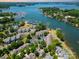 Stunning aerial view of lakefront community and boat marina with lake access at 7829 Village Harbor Dr, Cornelius, NC 28031
