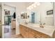 Bright bathroom with double sinks and modern fixtures at 7829 Village Harbor Dr, Cornelius, NC 28031