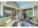 Inviting outdoor living space with sliding glass doors and cozy seating at 7829 Village Harbor Dr, Cornelius, NC 28031