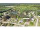 Aerial view of home in a community with a pond and wooded area, offering privacy and a natural setting at 921 Snow Prince Ln, York, SC 29745