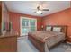 Well-lit bedroom with a comfortable bed, dresser, and a window with a view of the outdoors at 921 Snow Prince Ln, York, SC 29745
