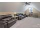 Bright bonus room featuring two comfortable sofas and a ceiling fan at 921 Snow Prince Ln, York, SC 29745