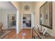 Bright foyer featuring hardwood floors, neutral walls, and entryways to living spaces, creating a welcoming ambiance at 921 Snow Prince Ln, York, SC 29745