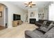 Spacious living room boasts a fireplace, built-in shelving, and a comfortable sofa for relaxation at 10024 Fox Trotter Ln, Midland, NC 28107