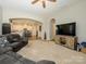 Open-concept living room with a view of the kitchen, creating a spacious and inviting atmosphere at 10024 Fox Trotter Ln, Midland, NC 28107