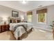 Bedroom with windows and carpet, providing ample natural light and comfortable space at 10626 Newberry Park Ln, Charlotte, NC 28277