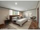 Staged main bedroom featuring a neutral color palette and natural light from the window at 110 Matthew Dr, Kings Mountain, NC 28086