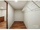 Spacious closet, including wire shelving with wood-look floors at 110 Matthew Dr, Kings Mountain, NC 28086