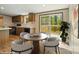 Eat-in kitchen featuring dark wood cabinets, stainless steel appliances, and deck access at 110 Matthew Dr, Kings Mountain, NC 28086