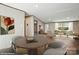 Bright living area with hardwood floors, seamless flow to other rooms, and a view to the exterior at 110 Matthew Dr, Kings Mountain, NC 28086