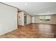 Bright living area with hardwood floors, seamless flow to other rooms, and a view to the exterior at 110 Matthew Dr, Kings Mountain, NC 28086