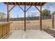 Outdoor patio with covered ceiling, overlooking a well-maintained backyard at 11039 Stetler St, Charlotte, NC 28204