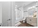 Well-lit bathroom features tile floors, sleek vanity, and shower-tub combo at 11039 Stetler St, Charlotte, NC 28204