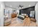 Bright bedroom with a stylish accent wall, hardwood floors, and modern decor at 11039 Stetler St, Charlotte, NC 28204