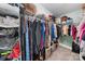 Walk-in closet is well-organized, with clothing racks, shelving, and space for shoes and accessories at 11039 Stetler St, Charlotte, NC 28204
