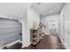 Welcoming hallway featuring hardwood floors, modern lighting, and stylish décor at 11039 Stetler St, Charlotte, NC 28204