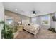 Spacious main bedroom featuring a bed, decor, a ceiling fan, and natural light at 11039 Stetler St, Charlotte, NC 28204