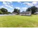 Expansive backyard with lush lawn and a view of the home's exterior at 115 Frances St, Salisbury, NC 28147