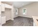 Bright, open-concept room with kitchen bar and natural light from two large windows at 115 Frances St, Salisbury, NC 28147