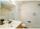 Functional bathroom with a single sink vanity, toilet, and shower-tub combination at 11630 Lioness St, Charlotte, NC 28273