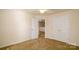 Inviting bedroom with neutral carpeting and a ceiling fan, complemented by ample closet space and natural light at 11630 Lioness St, Charlotte, NC 28273