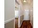 Welcoming entryway with wood floors, neutral paint, and a view into the adjacent living space at 11630 Lioness St, Charlotte, NC 28273
