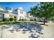 Charming townhouse with white siding, well-kept landscaping, and a paved driveway, offering curb appeal and convenience at 11630 Lioness St, Charlotte, NC 28273