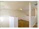 Loft area with neutral carpet and walls, offering a versatile space for an office or recreation room at 11630 Lioness St, Charlotte, NC 28273