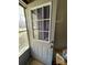 The interior view highlights a paneled front door, providing a glimpse of the home's entryway at 119 Lineberger St, Stanley, NC 28164