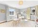 Bright Bedroom filled with light furniture, playful curtains, and a comfortable chair at 1310 Woodland Dr, Charlotte, NC 28205