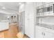 Kitchen features stainless steel refrigerator, microwave, granite countertops, and white cabinets at 1310 Woodland Dr, Charlotte, NC 28205