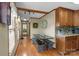 This dining area next to the kitchen features updated ceiling lights and a view to the backyard through a glass door at 139 Fort Dobbs Rd, Statesville, NC 28625