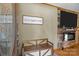 Inviting foyer with wood bench and wall decor, creating a warm and welcoming atmosphere at 139 Fort Dobbs Rd, Statesville, NC 28625