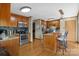 Well-appointed kitchen with stainless steel appliances, granite countertops, and wood cabinetry at 139 Fort Dobbs Rd, Statesville, NC 28625