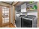 This conveniently located laundry room is equipped with modern washer and dryer units, perfect for easy chores at 139 Fort Dobbs Rd, Statesville, NC 28625